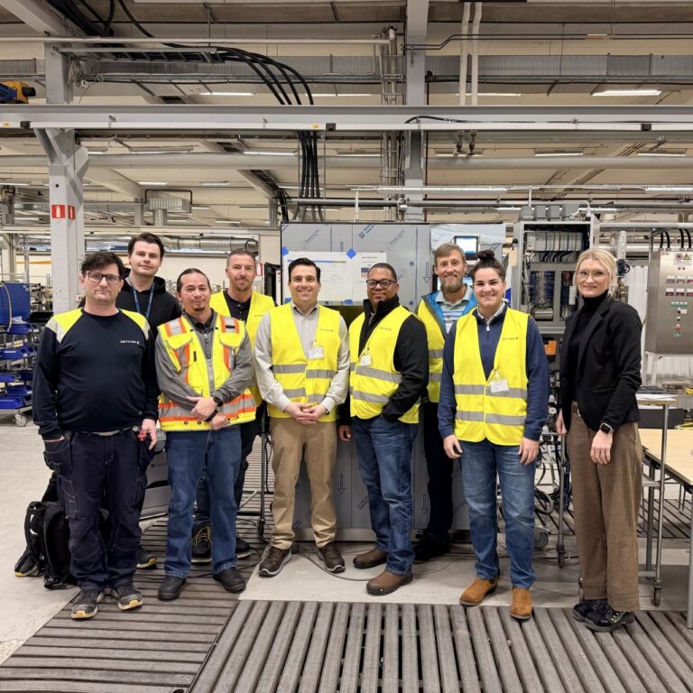 Amicus consultants with the project team at an equipment factory acceptance test